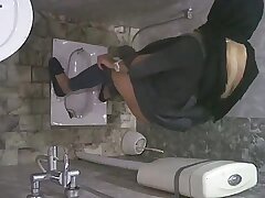 Iranian girl in public toilet